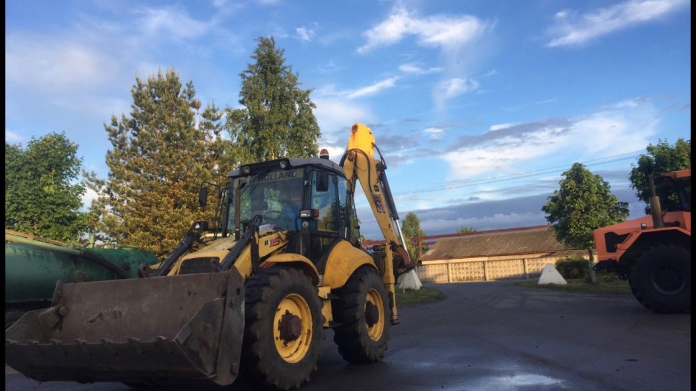 Экскаватор New Holland взять в аренду, заказать, цены, услуги - Приозерск
